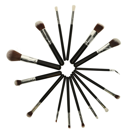 Set of makeup brushes arranged in a circular pattern on a white background
