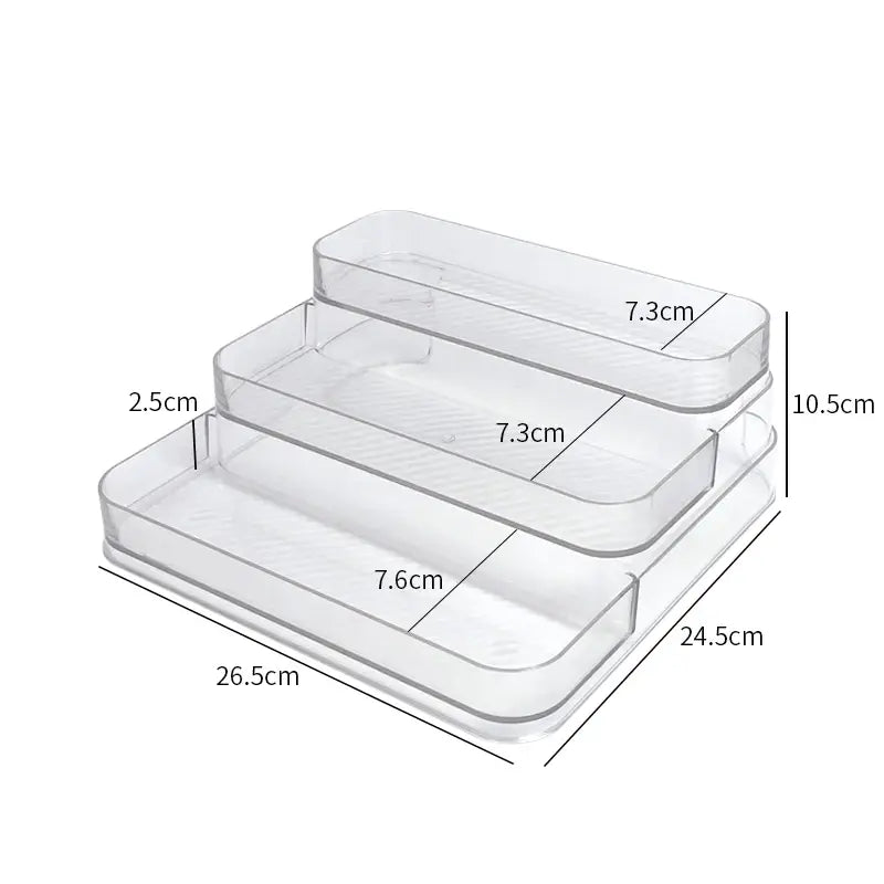 Set of three clear plastic containers with measurements on a white background
