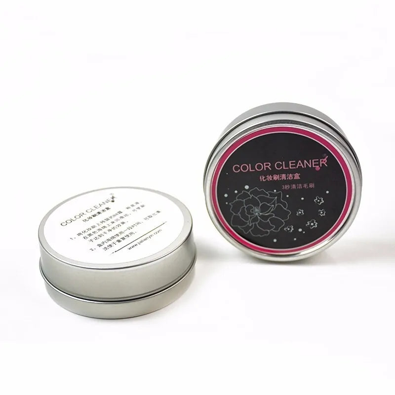 Two metal tins labeled 'Color Cleaner' on a white background