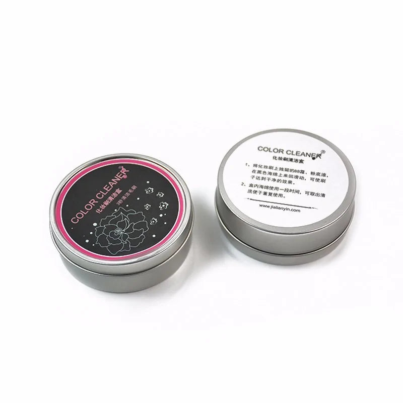 Two metal tins labeled 'Color Cleaner' on a white background