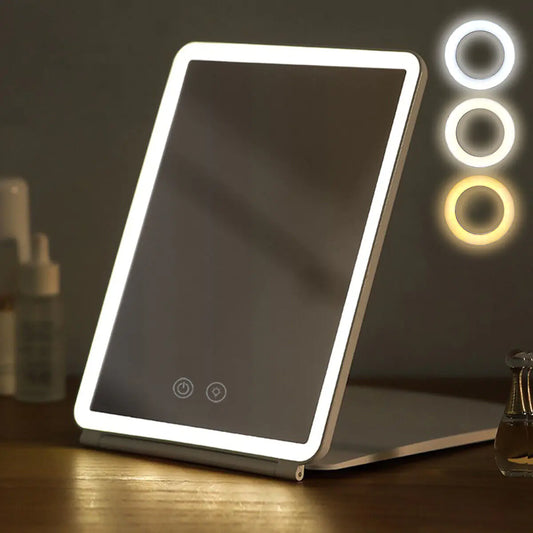 Makeup mirror with LED lights on a wooden surface