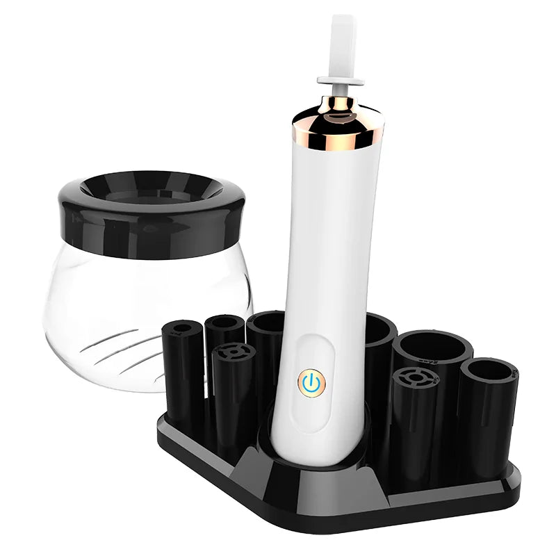 White electric toothbrush with black holder on a white background