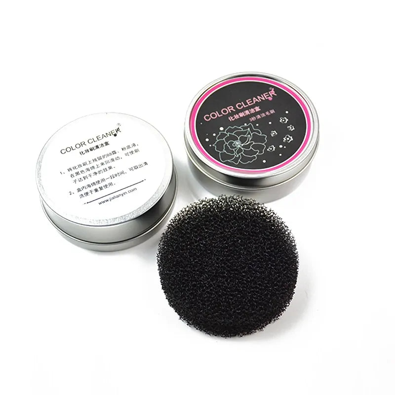 Black cleaning sponge with 'Color Cleaner' packaging on a white background