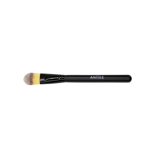 Makeup brush with black handle and gold ferrule on a white background