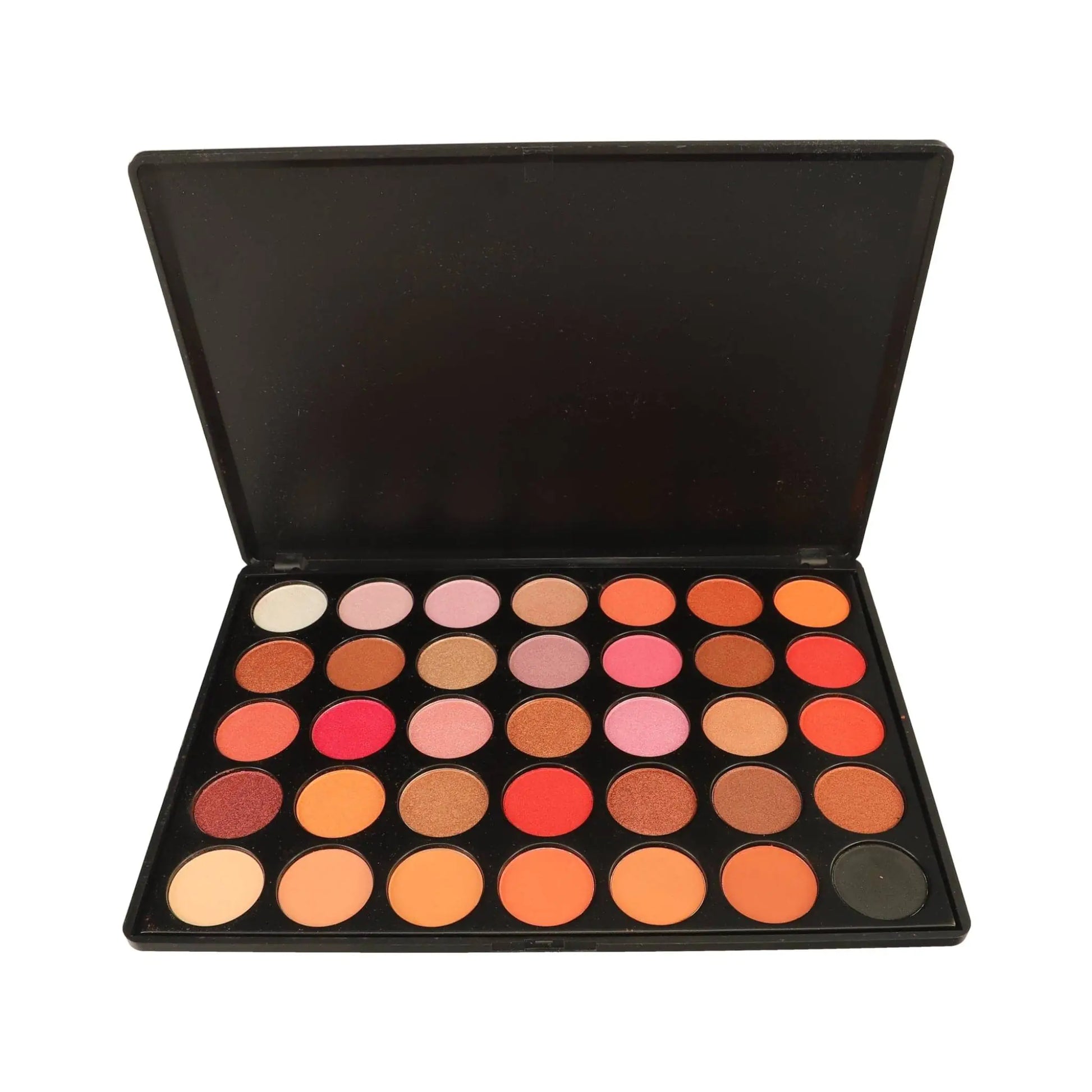 Makeup palette with various colors on a white background