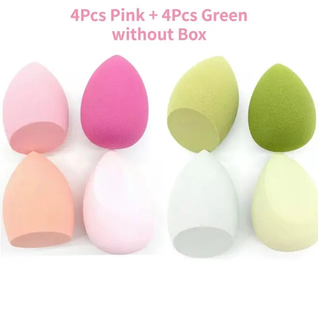 Set of pink and green makeup sponges on a white background with text indicating quantity and color.