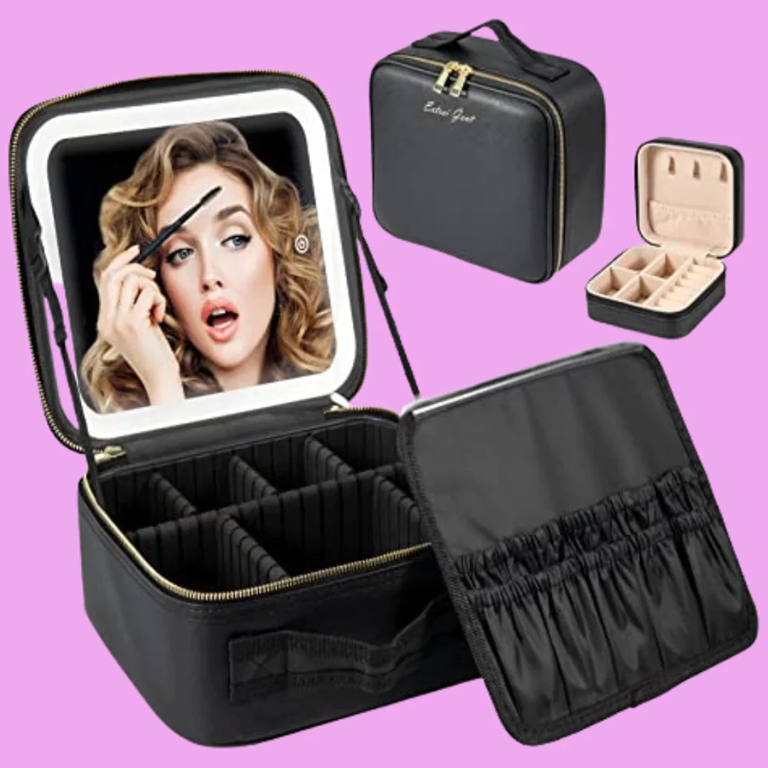 Black makeup travel case with mirror and jewelry compartment on a pink background