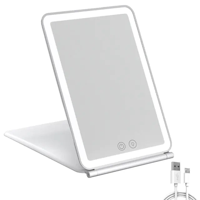 Lighted makeup mirror with charging cable on a white background