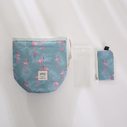 Flamingo-patterned pouches on a white background
