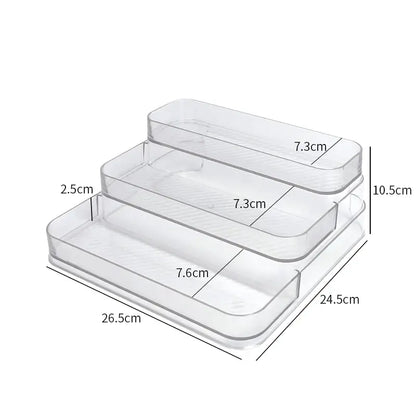 Set of three clear plastic containers with measurements on a white background
