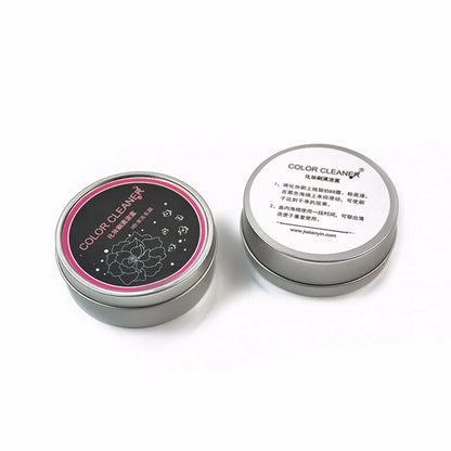 Two metal tins labeled 'Color Cleaner' on a white background