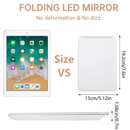 Folding LED mirror with an iPad for size comparison, showing dimensions on a white background.