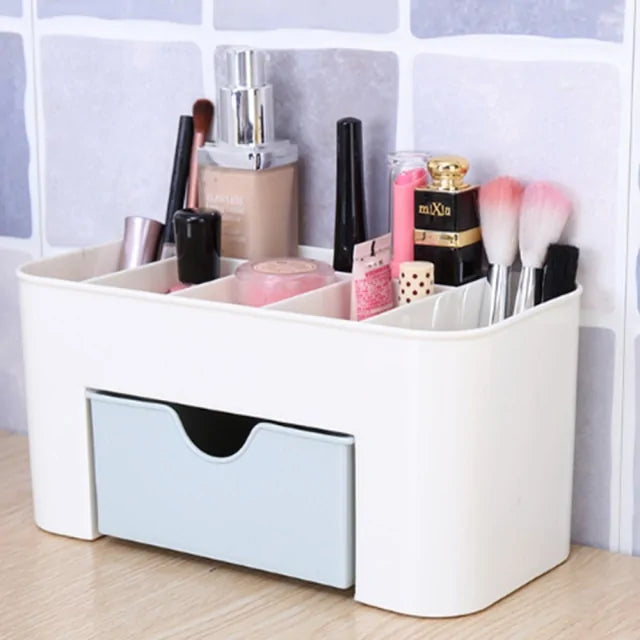 White cosmetic organizer with makeup items on a wooden surface.